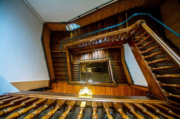 Looking east down the main staircase of the Grey Nuns residence, as viewed from above.