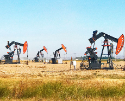 What happens when 50 reporters and 3 media outlets team up to investigate the price of oil?