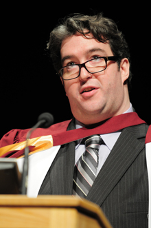 Art historian Luke Nicholson during his valedictorian speech at the fall 2011 convocation ceremony for the Faculties of Fine Arts and Engineering and Computer Science.