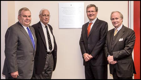 From left: J. Birks Bovaird, Evan Birks, Alan Shepard and Jonathan Birks unveil a plaque in the Webster Library on October 17 to honour the Birks family’s contributions to Concordia.