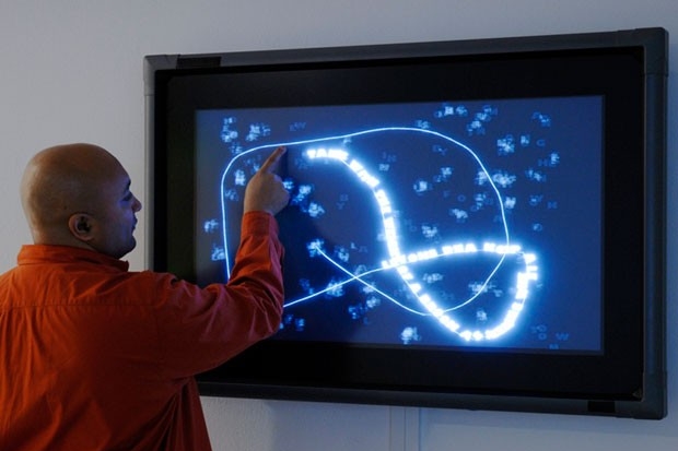 Jason Edward Lewis using Obx Labs’ interactive touch poem