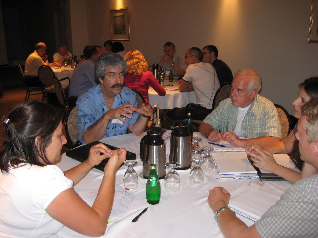 Richard Bastien (left) leads a discussion during the Quebec Institute for Lead Learners.Photo by Concordia University