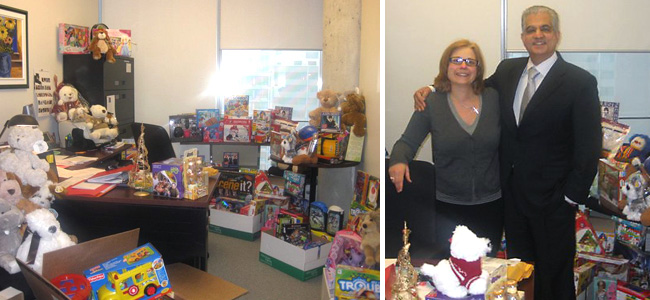 Dean of the John Molson School of Business Sanjay Sharma stands with Eva Ferrara, Department Coordinator, Decision Sciences and Management Information Systems. Her office contains just some of the toys donated during the drive. MB 012-117John Molson School of Business