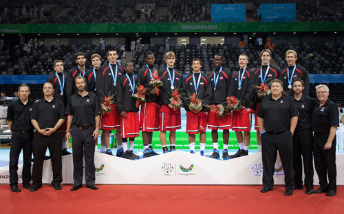 The Canadian men’s basketball team pose with silver medals at the 2011 Summer Universiade in Shenzhen, China. | Image courtesy of SendtoNews
