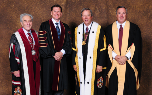 From left to right: Concordia's President and Vice-Chancellor Frederick Lowy; honorary doctorate recipient and TELUS CEO, Darren Entwistle; Concordia's Chancellor, L. Jacques Ménard; Incoming Chair of Concordia’s Board of Governors, Normand Hébert Jr. Concordia alumnus Darren Entwistle was honoured at the John Molson School of Business ceremony for his visionary leadership in the telecommunications industry, and his diverse philanthropic contributions.
