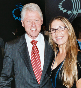 Deborah Bassett has been able to combine her activism with her skill as a journalist and photographer, and consults for start-up, non-profits. Bassett is seen with former U.S. President Bill Clinton at the 2007 Clinton Global Initiative in New York City. She was covering the event for non-profit media organization Channel G.