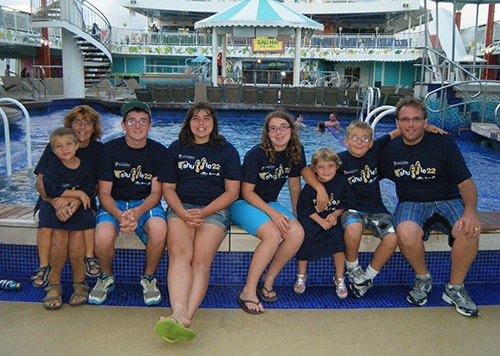 The Bergeron family display their Shuffle 22 spirit on September 16, 2011, aboard their ocean cruise: (from left) Luke, Nancy, Jonathan, Elizabeth, Sarah, Laura, Matthew and Serge.
