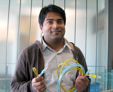 Mohammad Nurujjaman holds up some Ethernet cable, a robust technology still evolving since it was developed 40 years ago. | Photo Concordia University