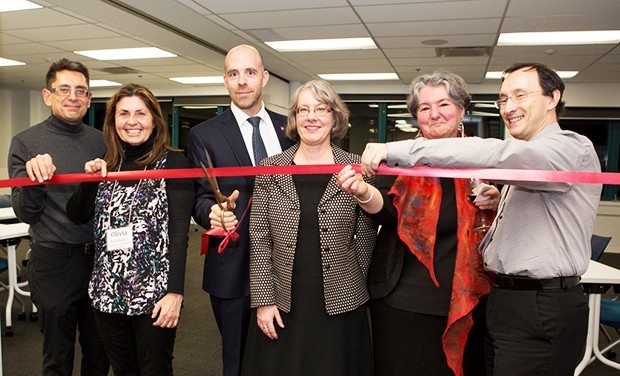 Benoit-Antoine Bacon, provost and vice-president, Academic Affairs cuts the ribbon at the official opening of the Centre for Teaching and Learning.
