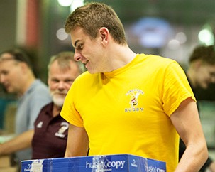 Men’s rugby team — the Used Book Fair’s go-to cleanup crew