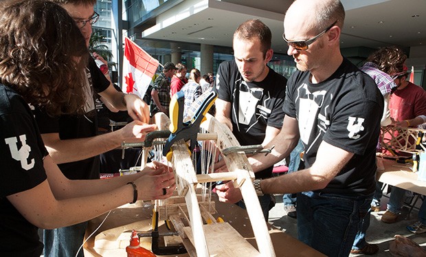 At the Troitsky Bridge Building Competition students from across Canada make bridge parts out of Popsicle sticks, white glue, floss and toothpicks before submitting them to "the Crusher."