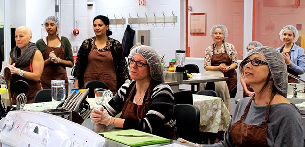 CanDonate women participate in a healthy cooking class in PERFORM’s Teaching Kitchen.