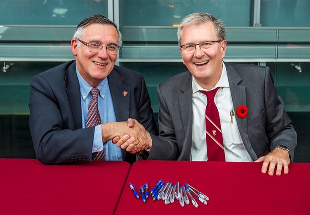 Concordia President Alan Shepard and Ted Stathopoulos, president of CUFA sign the collective agreement. | Photos by Concordia University