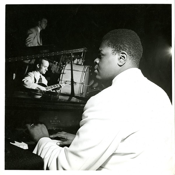 Peterson with drummer Russ Dufort and guitarist Armand Samson, on stage with the Johnny Holmes Orchestra at Victoria Hall in 1946. | Courtesy of Concordia Records Management and Archives