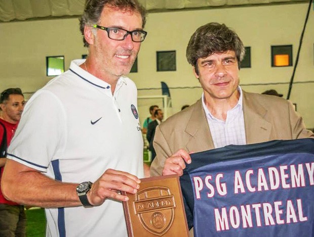 PSG coach Laurent Blanc with the Montreal academy's director, Guillermo Gulli.