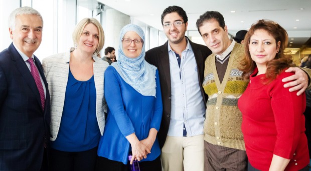 Elias Alsahwi is flanked by (from left to right) Don Taddeo, assistant to the president of Loyola High School, CCE language teachers Sherry Blok and Rebecca Davidson, and his parents Haitham Alsahwi and Samraa Abou Seif. | Photo by Jasmine Stuart