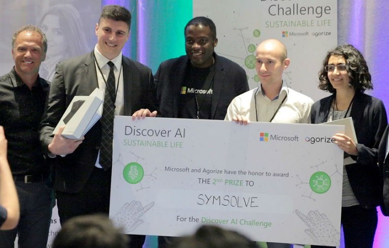 Marc Seaman (Microsoft Canada), Matthew Mannarino, Wemba Opota (Microsoft Canada), Paul Bugnon and Sara Amini at the Discover AI Challenge in Toronto, where the SymSolve team earned second place