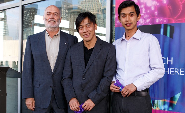 Petro-Canada Young Innovator Award recipients David Kwan (centre) and Tsz-Ho Kwok (right) with Christophe Guy.
