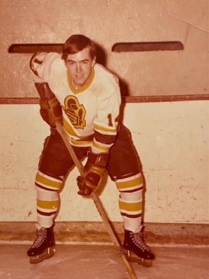 Kevin Devereux in the 1970s, in his old hockey uniform, on ice.