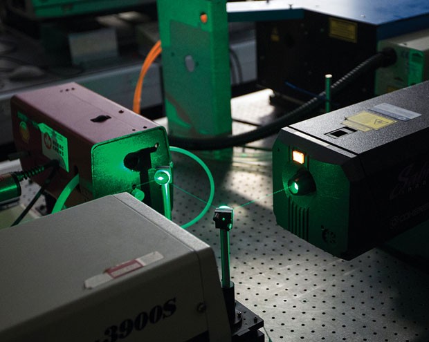 The Lanthanide Research Group uses high-powered laser equipment for their scientific investigations.