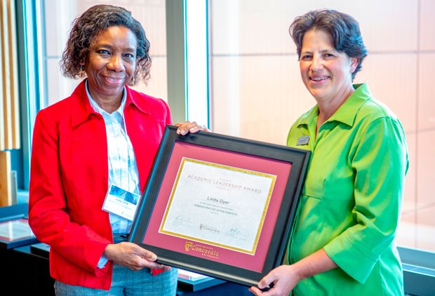 Academic Leadership Award winner Linda Dyer (left) with Nadia Hardy, vice-provost of Faculty Relations. 
