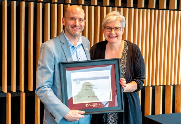 Provost's Circle of Distinction inductee Simon Bacon with Lisa Ostiguy, deputy provost.