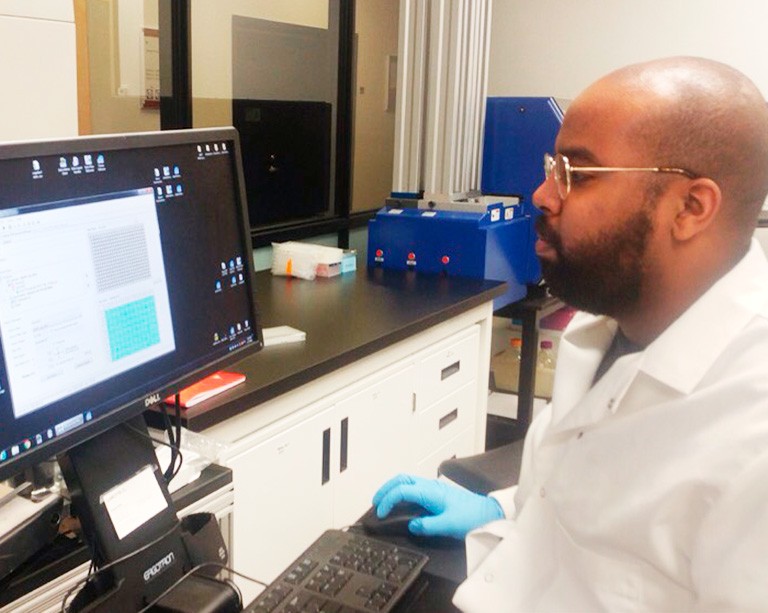 Grad student Jama Hagi-Yusuf is investigating how to convert fatty acids into biofuels 