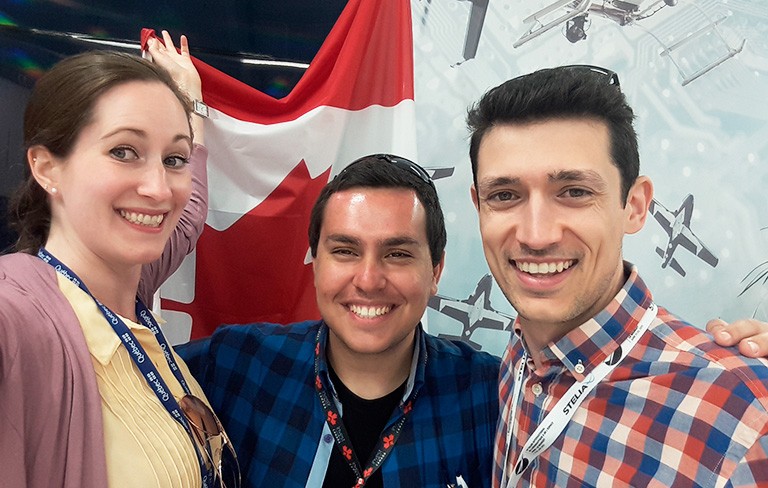 Andréa Cartile (left) and James Mariotti-Lapointe (right) with a friend from the Paris Air Show.