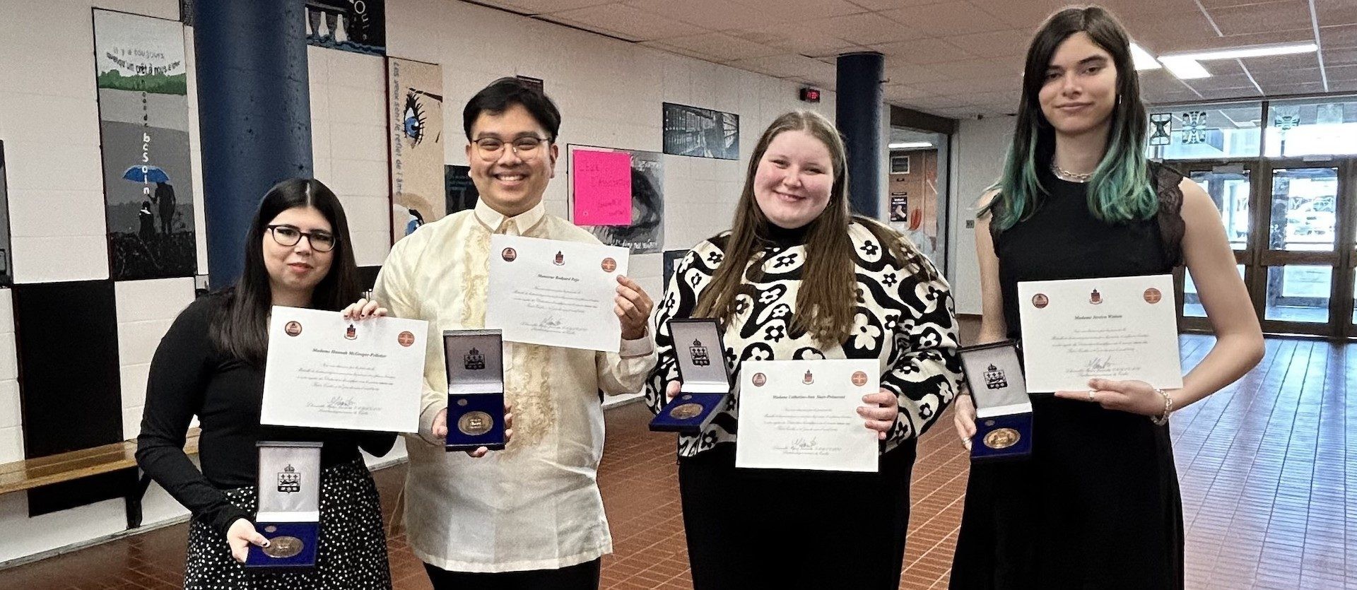 Hannah McGregor-Pelletier, Rudyard Pejo, Catherine Starr-Prenovost and Jessica Winton smiling with their awards.