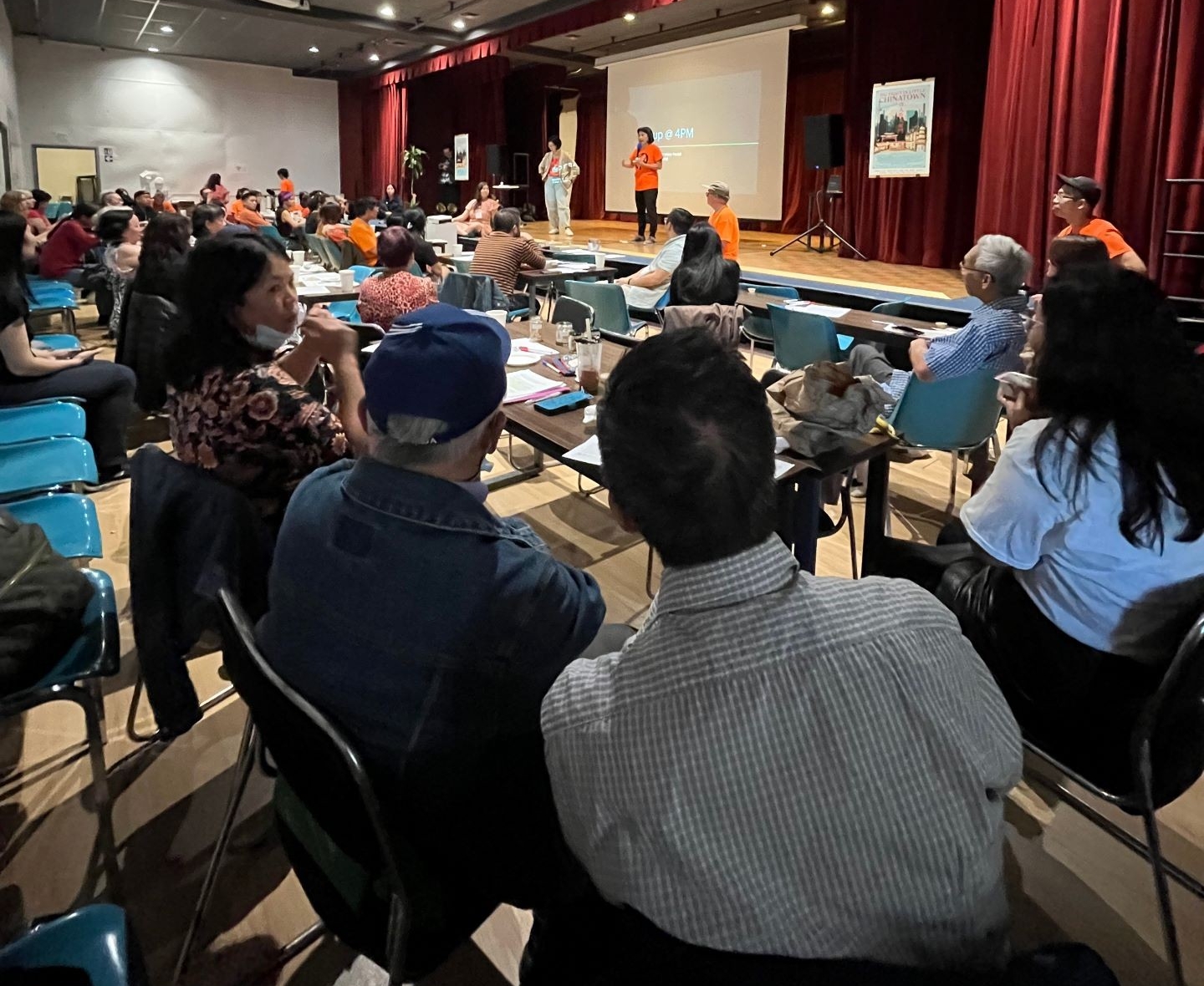 Audience at a panel discussion in an auditorium