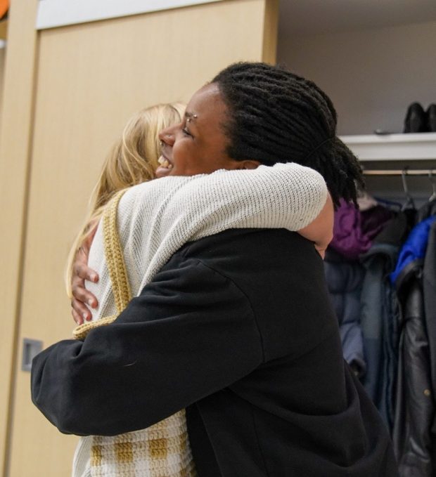 Two people hugging in the SHIFT Centre
