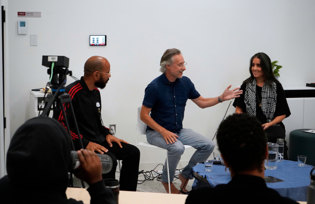 Image of the event panelists in conversation