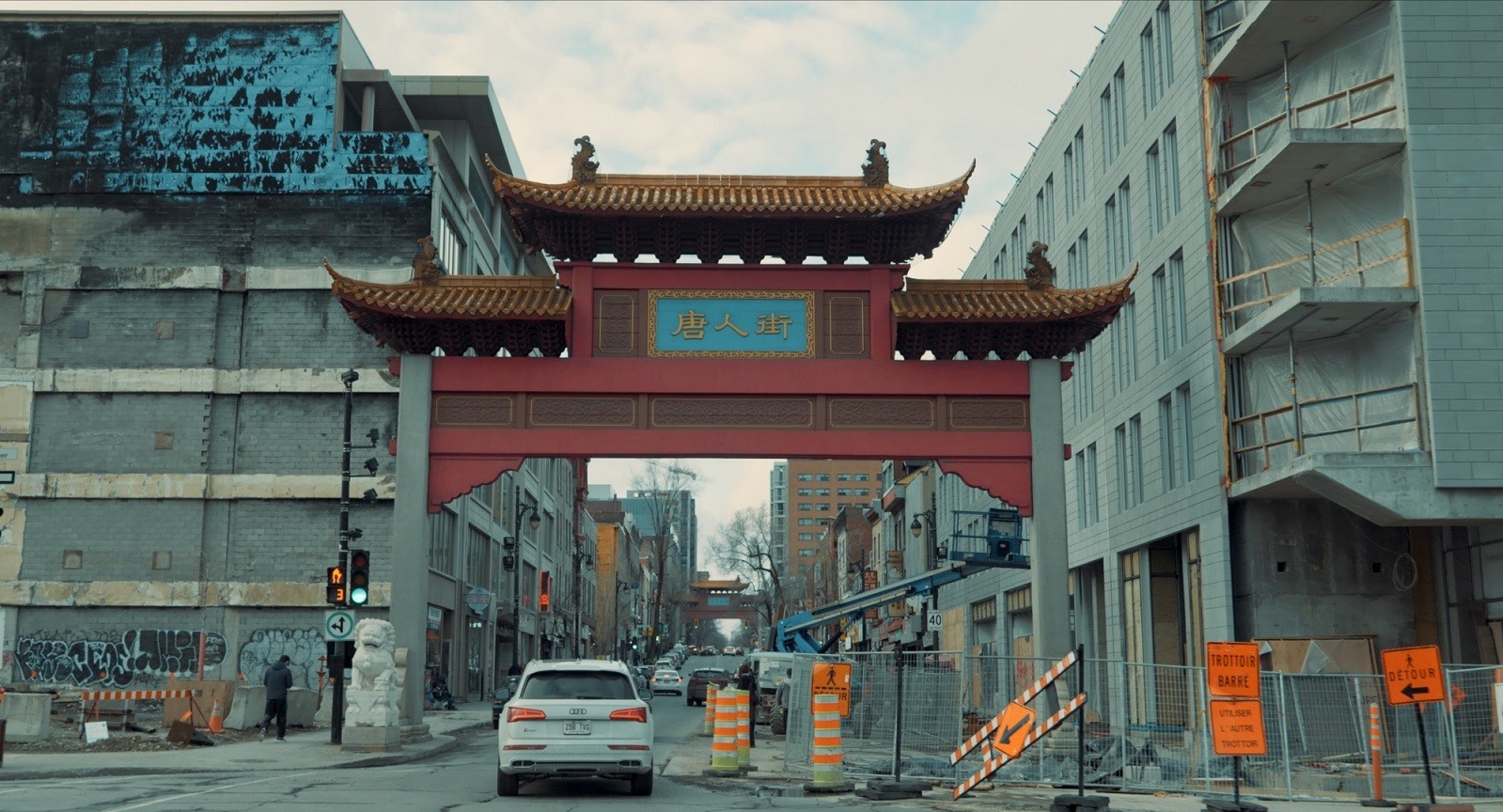 Still from the Big Fight in Little Chinatown (2022) that shows the development projects encroaching on Chinatown's red gates