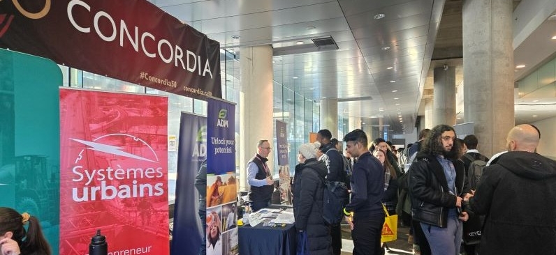 People milling about an information fair