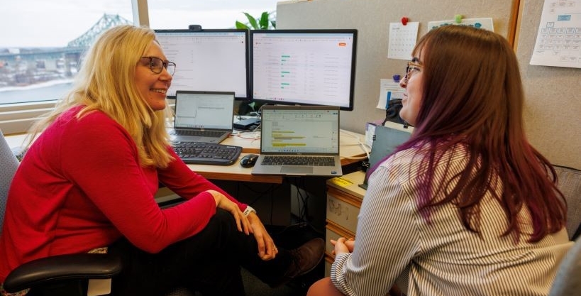 Concordia co-op student with her supervisor in a Montreal office