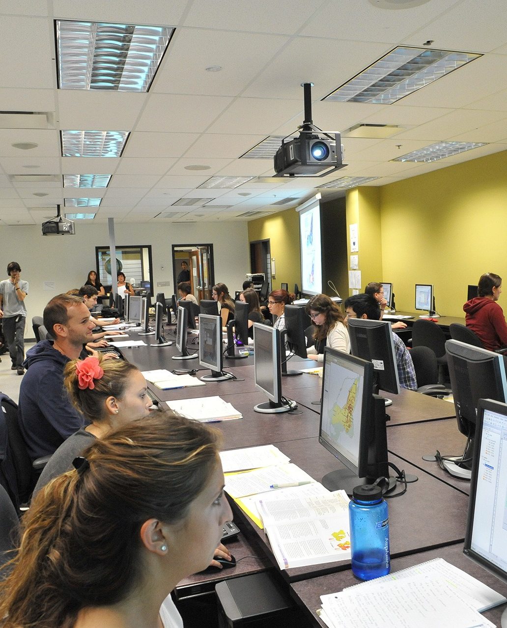 Students are working on their projects in a computer lab