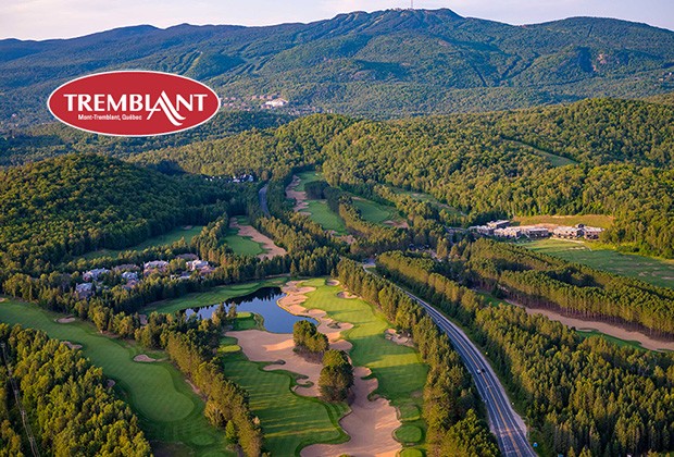 Tremblant logo superimposed on an aerial view of the golf course in the summer.