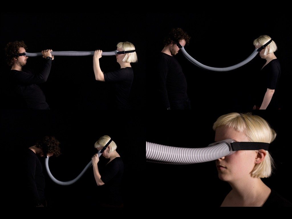 Christopher Moore: Eyeline™, from the Intimacy Devices series, 2020 Artwork depicting a woman and man wearing goggles connected by a flexible tube.