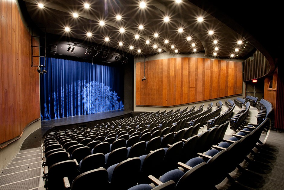 DB Clarke seating and stage DB Clarke theatre looking at stage with blue curtains closed