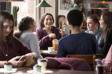 Young people socializing in a restaurant