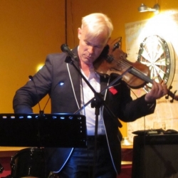 Norman Nawrocki playing violin. 
