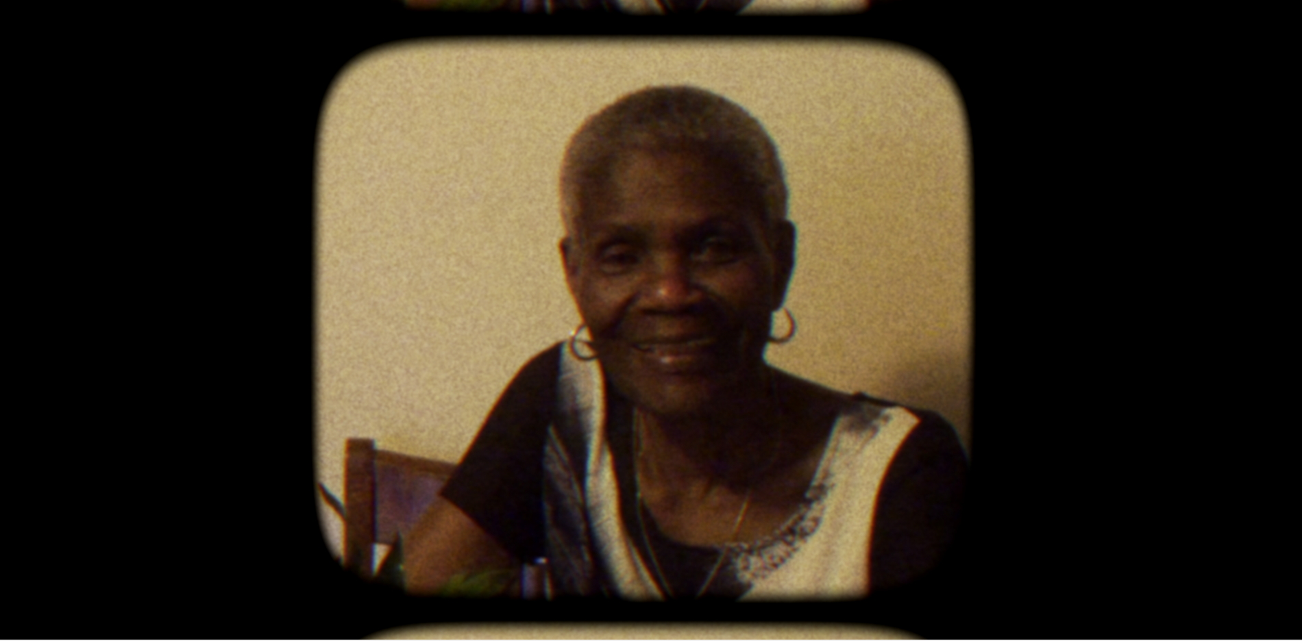 portrait of a Black women elder. Vintage cinematographic treatment.