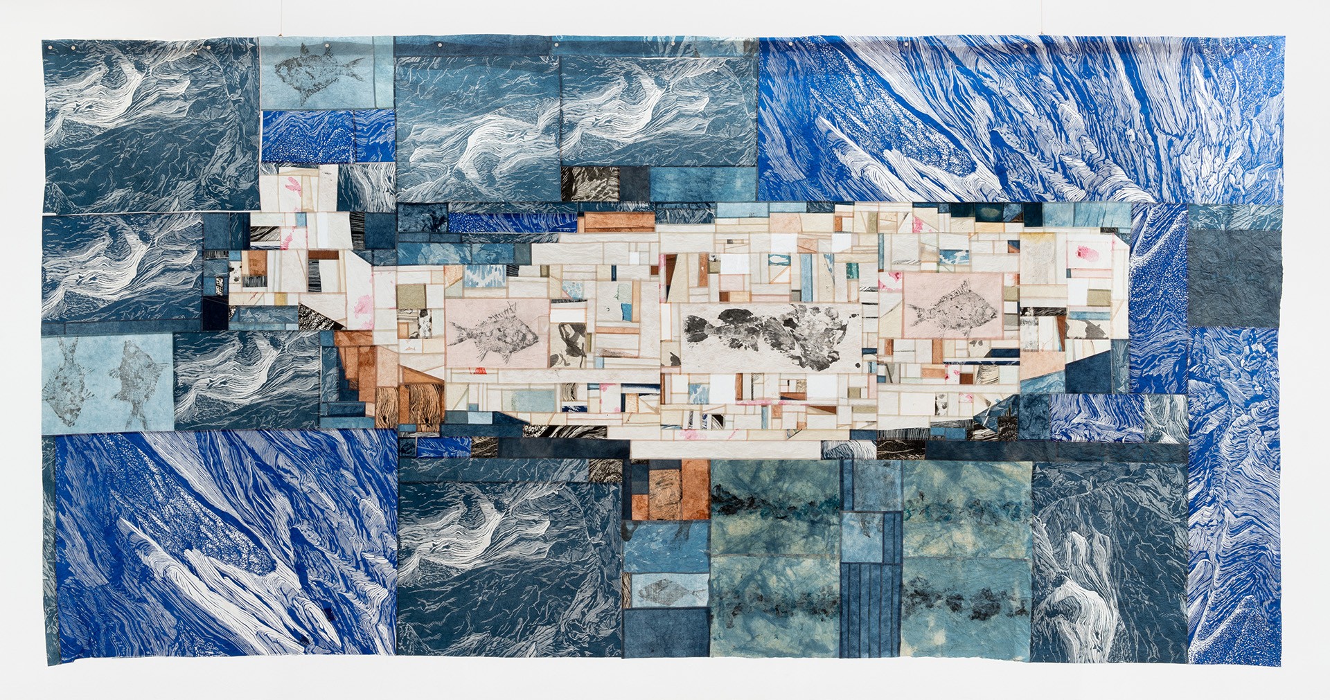 Handcarved and handprinted lino blocks to create the ocean like design around surrounding a patchworks wale and depict a wind-chiseled sea ice in the arctic. Traditional paper and papermaking techniques from East and Southeast Asia were applied in the making.