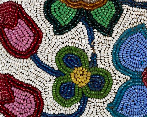 unidentified Ojibwa woman, floral beadwork from a saddle, nineteenth century, glass beads and hide, 12 x 12 cm. Museum of Anthropology, University of British Columbia. unidentified Ojibwa woman, floral beadwork from a saddle, nineteenth century, glass beads and hide, 12 x 12 cm. Museum of Anthropology, University of British Columbia.