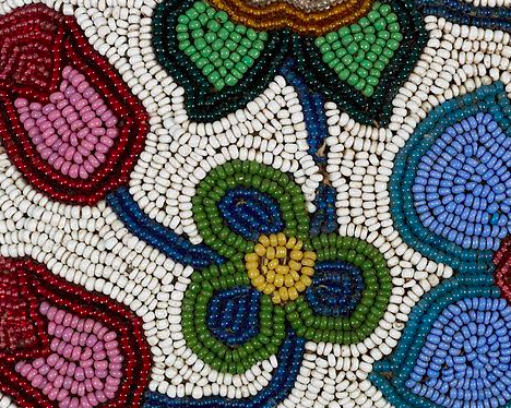 unidentified Ojibwa woman, floral beadwork from a saddle, nineteenth century, glass beads and hide, 12 x 12 cm. Museum of Anthropology, University of British Columbia.