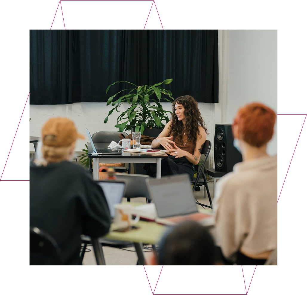 People sitting at a workshop
