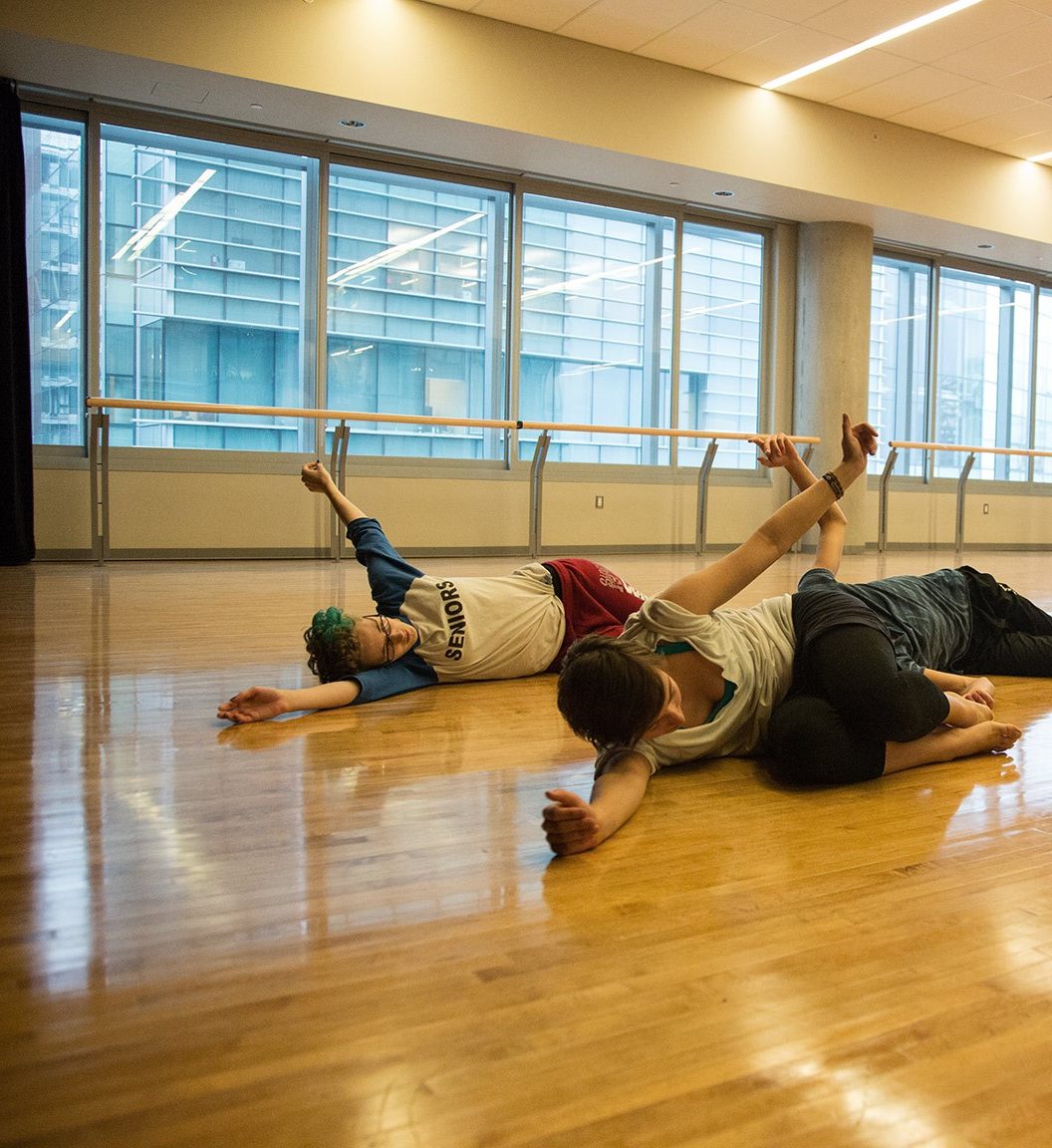 a group of students practicing movements at Concordia University's dance facilities