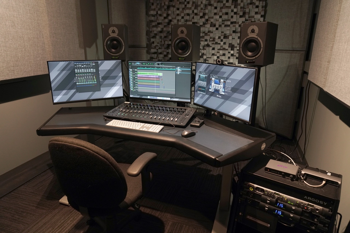 Two monitors, three speakers and a sounds board