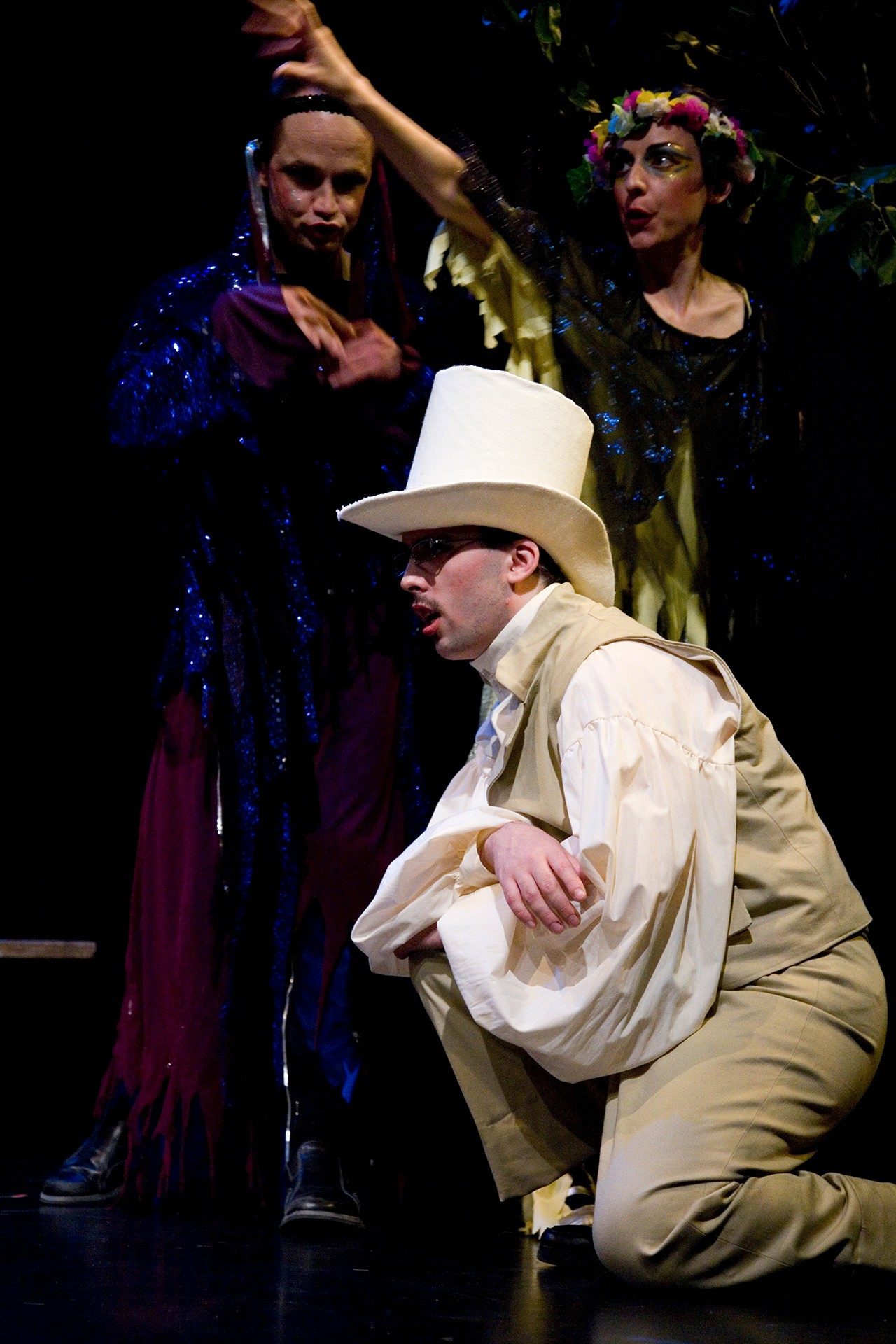 CAHD in performance 3 people in costume on stage.