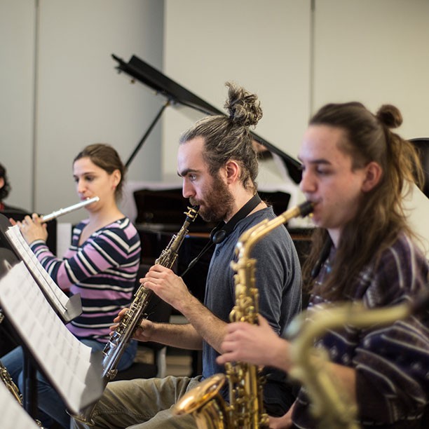 Members of the eclectic ensemble practising